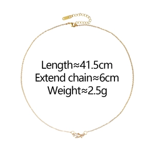 Macro shot of gold geometric zircon necklace showing 41.5cm length and 6cm extender chain