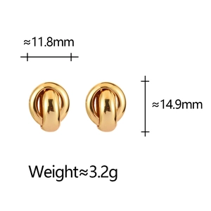 Minimalist twisted double hoop gold earrings with vintage geometric aesthetic