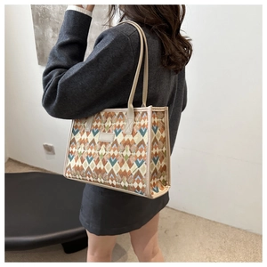 Checkered canvas tote bag shown worn by model with high-quality jacquard weaving texture
