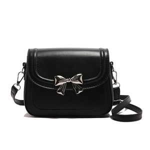 Minimalist black faux leather crossbody bag with elegant silver metal bow detail