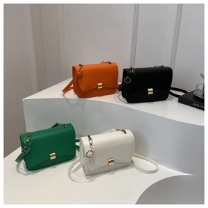 Minimalist square crossbody bags in four colors with golden magnetic clasps and slim straps