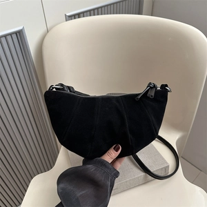 Retro black matte suede croissant shoulder bag with pleated crescent shape design