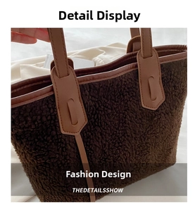 Detail of brown plush tote bag showing soft fuzzy texture and durable leather handles