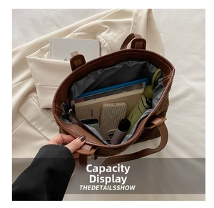 Internal view of brown plush tote bag showing large capacity for essentials like tablet and books