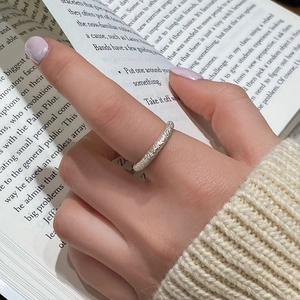Irregular pleated silver ring with matte texture and adjustable opening for women