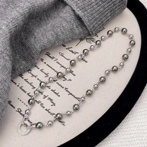 French vintage grey pearl necklace with zircon toggle clasp and knitted sweater accent