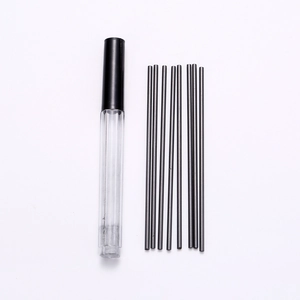 Detail of 2B mechanical pencil lead refills in a transparent storage tube with black cap