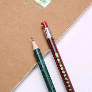 Macro detail of 2B 2.0mm mechanical pencils with leaf prints and classic stripes