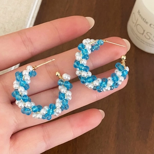 Handmade C-shaped hoop earrings with blue crystal beads and white pearls for summer