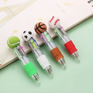 Detailed view of sports-themed multi-color ballpoint pens with soccer and basketball toppers