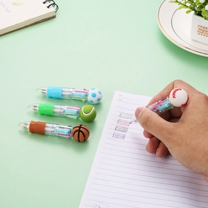 Four-color sports ballpoint pens with cartoon soccer basketball and tennis ball toppers
