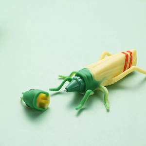 Creative grasshopper shaped ballpoint pen with green silicone shell and removable cap