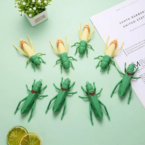 Top view of eight locust-shaped novelty ballpoint pens arranged in a decorative circle