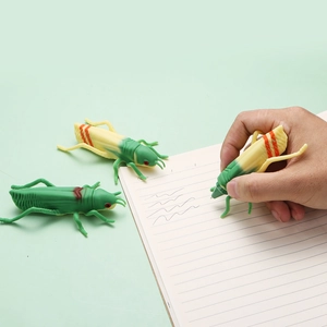Detail of creative grasshopper shaped ballpoint pen with realistic silicone shell texture