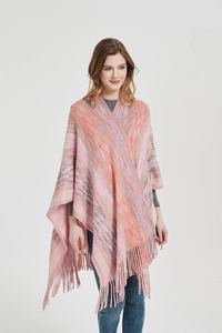 Detail of multi-color gradient knit poncho featuring V-neck and long fringed tassels