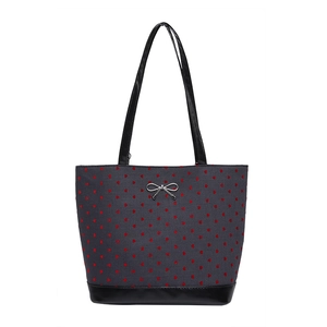 Gray tote bag with red heart pattern and silver bow accent for daily fashion