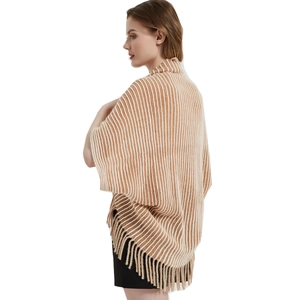 Women's knit poncho cape with vertical brown stripes, high neck and fringed hemline