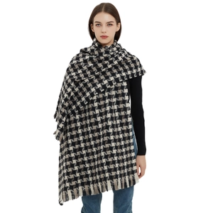 Classic black and white houndstooth scarf with fringe tassels for winter warmth