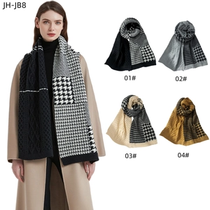 Thick knit infinity scarf featuring classic houndstooth patterns and chunky cable knit