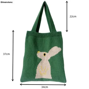 Tabella taglie dettagliata per borsa tote in maglia verde con motivo a coniglio
