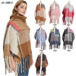 Thick oversized plaid mohair shawl with tassels shown in seven diverse color variants