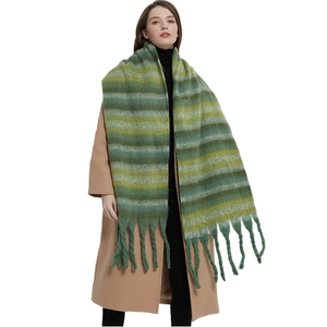 Thick striped knit scarf with long tassels in dark green and yellow for winter warmth