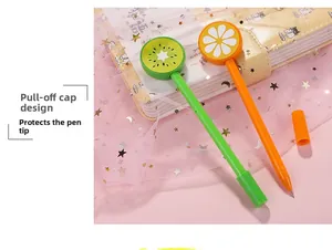 Detail von kreativen Frucht-Gelschreiber mit Kiwi- und Orangen-Design und Schutzkappen
