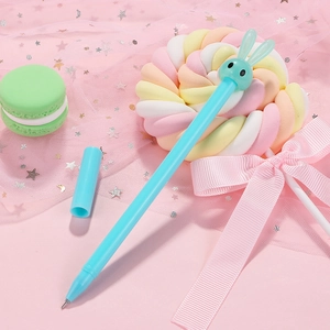 Cute light blue cartoon rabbit gel pen on a pink starry tulle background with candy decor