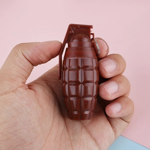 Creative grenade shaped mini retractable ballpoint pen with detailed plastic texture