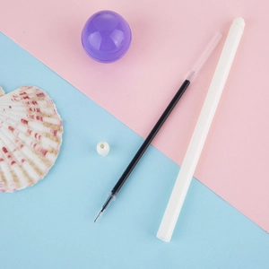 Creative lollipop-shaped 0.5mm black ink gel pen with matte white barrel and refill