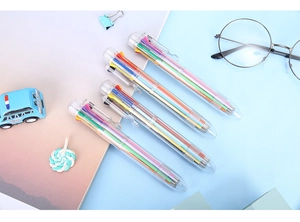 Macro detail of transparent 8-color retractable ballpoint pens with multi-color ink refills