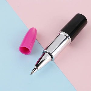 Creative lipstick-shaped ballpoint pen with silver metal finish on pink blue background