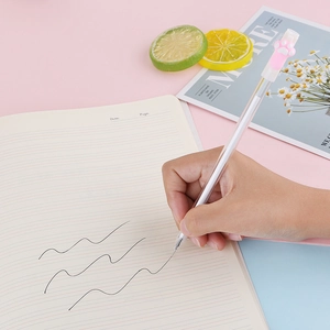 Stylo gel créatif en plastique transparent avec patte de chat rose sur carnet