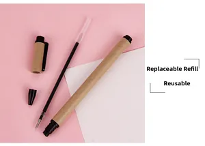 Detailed view of eco-friendly kraft paper pen showing refillable ink and internal parts