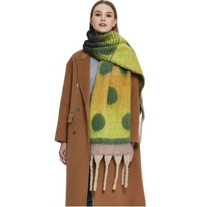 Thick winter scarf with colorful color-blocking, polka dots, and chunky tassels for women