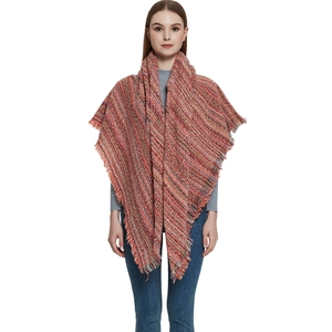 Thick orange knit shawl scarf with long tassels and multicolor woven fabric for winter
