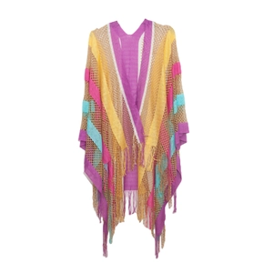 Detailed view of hollow knit shawl with colorful rainbow stripes and long fringe tassels