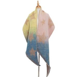 Detail of soft stars patterned shawl with yellow pink blue gradient and fringe edge