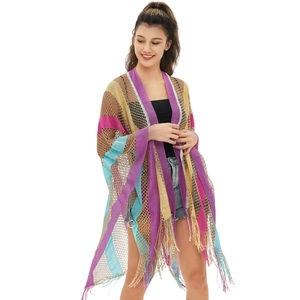 Bohemian open-knit shawl with colorful rainbow stripes and long fringe tassels