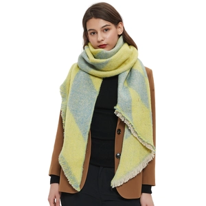 Cozy yellow and blue plaid knit shawl with long fringe tassels for autumn and winter wear