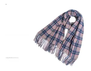 Close-up of pink and blue checkered thick winter scarf with fine tassel fringe details
