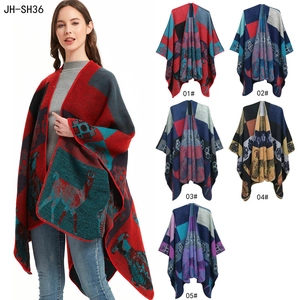 Ethnic knit shawl cloak with geometric patterns and alpaca animal motifs for winter