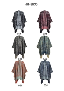 Selection of women's knitted shawls with vintage paisley patterns in diverse colors