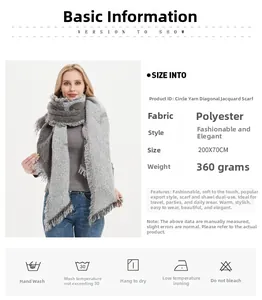 Detail of grey loop yarn jacquard scarf with anchor pattern, tassels, and 200x70cm size