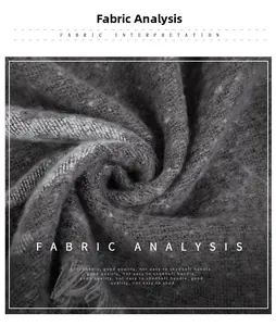 Macro detail of soft grey knit fabric with brushed texture and elegant fringe details