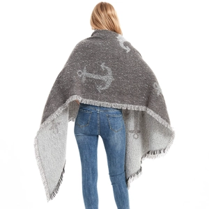 Thick dark grey knitted shawl with light grey anchor pattern and tassel hem details