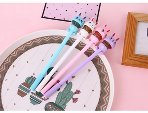 Close-up of four colorful cartoon rabbit pens with spring heads on a decorative plate