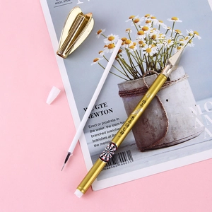 Creative gold metallic fidget spinner pen set with darts pattern on pink floral background