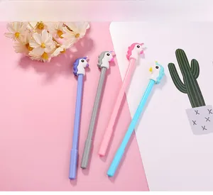 Set of four cute unicorn neutral pens in pastel colors on a soft pink background