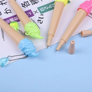 Macro detail of creative ice cream cone pens with waffle texture and colorful cream tops